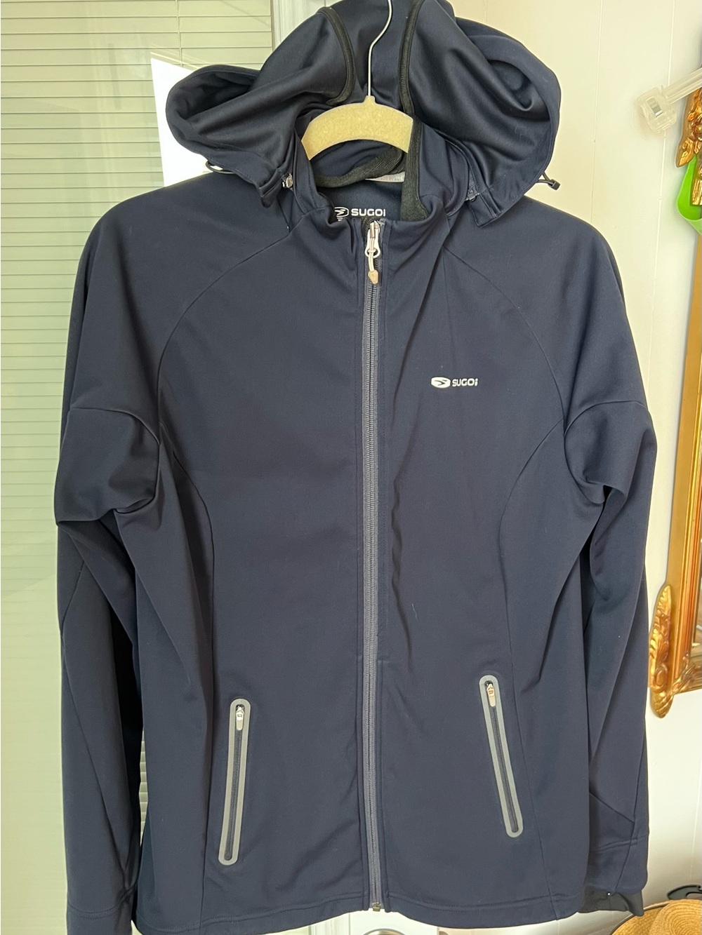 SUGOI dark Navy Hooded cycling and running jacket